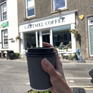 Drinking coffee in Cartmel, a small town in the Lake District, England