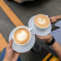 a nice little cafe by a parking lot