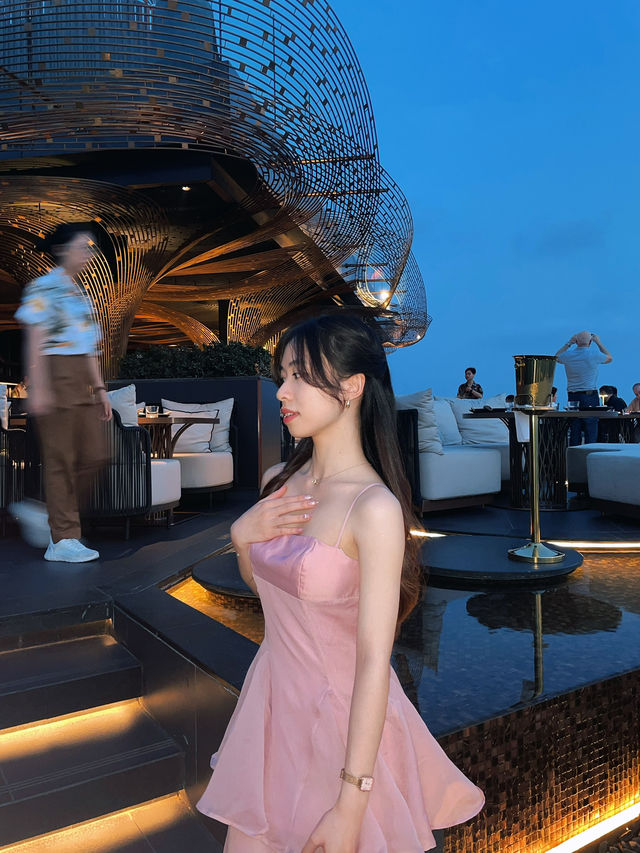 Pink dress with Mahanakhon sunset