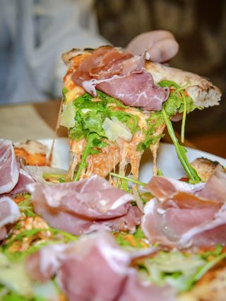 Making handmade pancakes on-site, aiming to reach the summit.