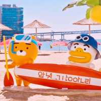 🌊📸 *Gwangalli Beach’s Kakao Friends Photo Zone: Cute Overload by the Sea!* 🌴💛