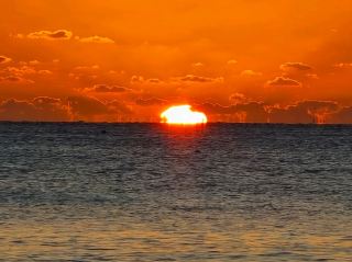 Most Magical Sunsets in Grand Cayman: Seven Mile Beach & West Bay

If there’s one moment that defines Grand Cayman, it’s sunset—and there’s no better stage for it than the island’s western shoreline.

🏖 At Seven Mile Beach, the day doesn’t just end—it transforms. The sand stays warm under your feet as the sky begins to shift, slowly at first, then all at once soft gold turns into glowing orange. 
 
Best months for clear skies: December to April (peak season) - less humidity, drier air

🏖 West Bay Beach: Fewer crowds, wider views, and a horizon that seems to stretch forever. Here, the sun sinks low and dramatic, casting long reflections across the water while fishing boats drift quietly in silhouette. 

Best months: December- March 
#sunset_madness #beach #naturalwonders #travel #travel2026 