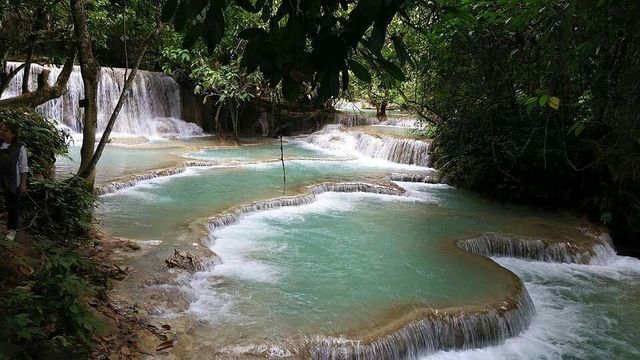 Luang Prabang's Tranquil Tapestry 🏞️🏰