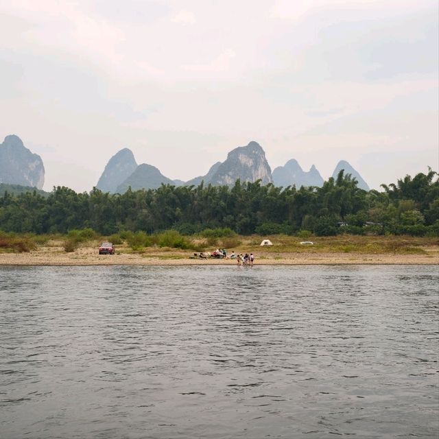 Yangshuo – Where the River Meets the Green 🌿🏞️🌊 Yangshuo – Where the River Meets the Green 🌿🏞️🌊