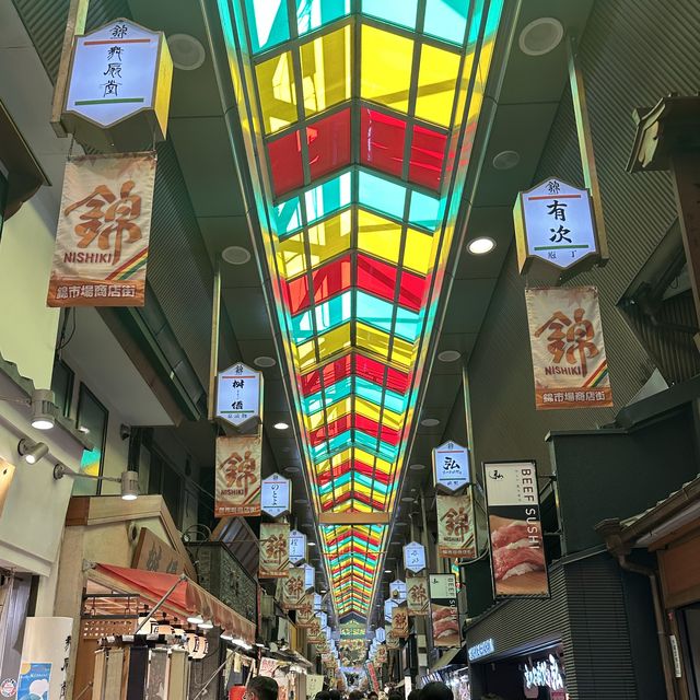 Colourful street market with many shops