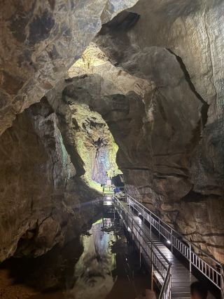 A magnificent cave with a waterfall you must visit!