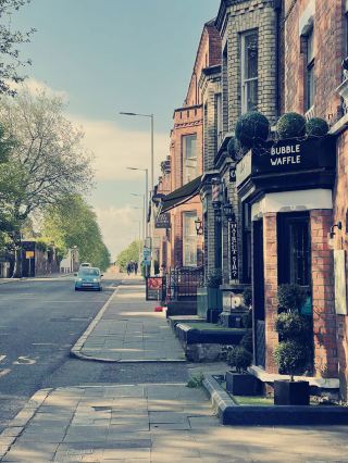 Where Historic Red Bricks Meet Academic Excellence: Queen's University Belfast.