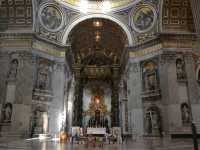 The symbol of the Holy See, Saint Peter's Square and Basilica