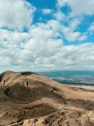 An Amazing Journey: The Magnificent Scenery of Mount Aso and the Nighttime Gundam Spectacle