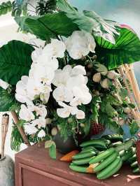 “Blooming Raya: A Garden of Traditions”