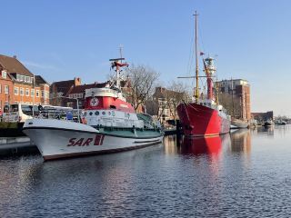 Emden is a coastal city in northwestern Lower Saxony, Germany, situated along the North Sea coast near the Dutch border, with a population of approximately 50,000.