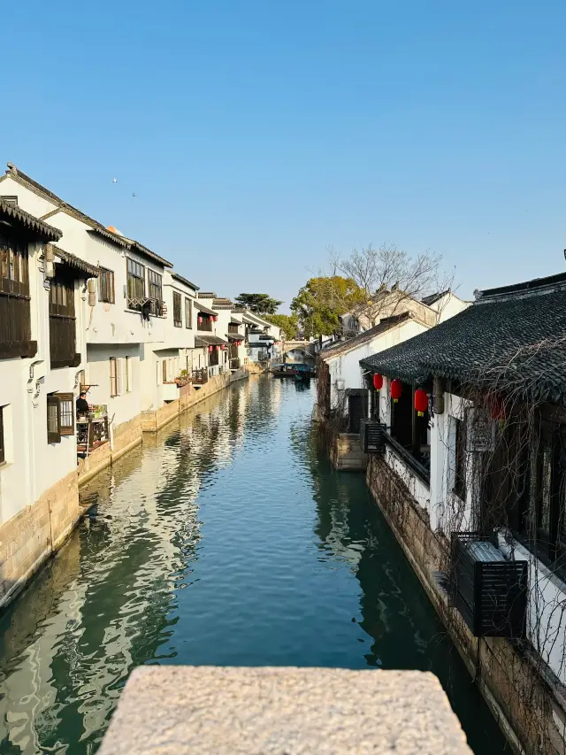 Who hasn't visited this ancient town in Suzhou yet?