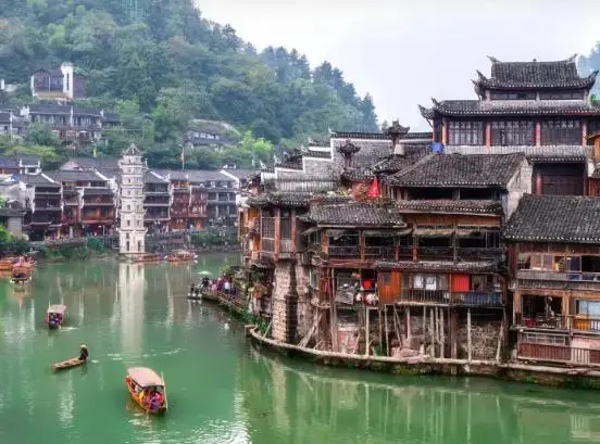 "Fenghuang Bonfire: Enchanting Night Dance"