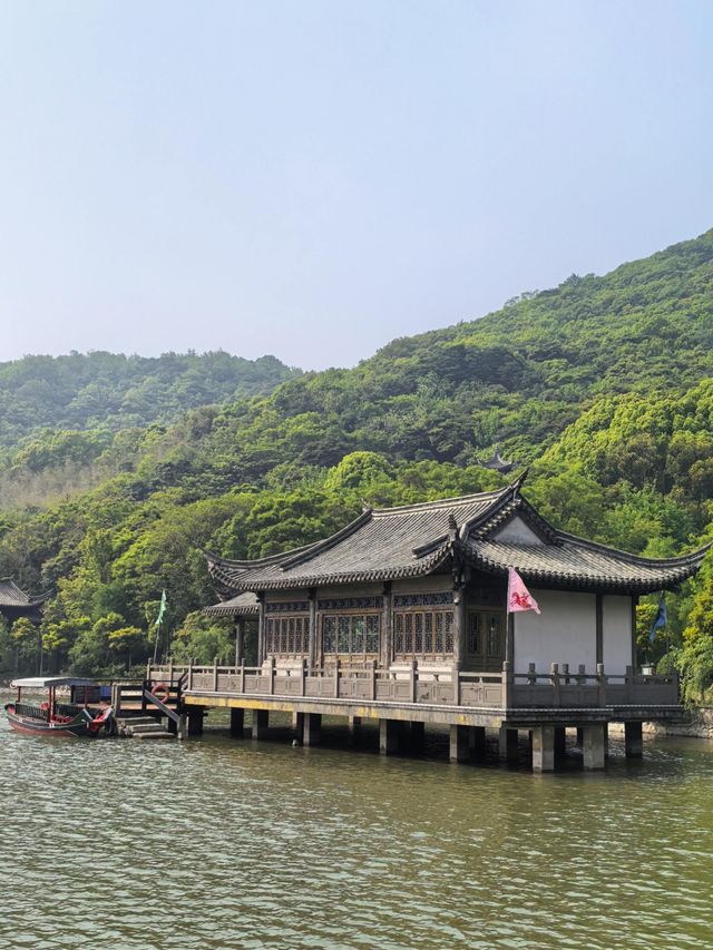 桃花影落，碧海潮生