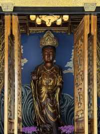 Serene temple next to busy Taikoo Li