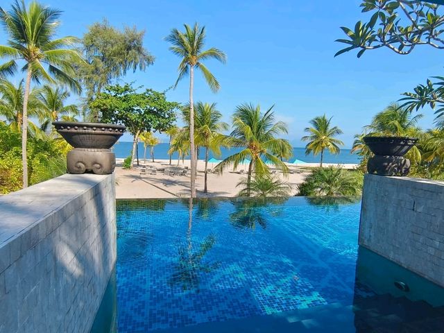 Four Seasons Langkawi: Where Rainforest Canopy Kisses Andaman Shores