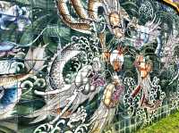 Vibrant stories on the Walls in Hall of Universal Brightness car park at Kong Meng San Temple
