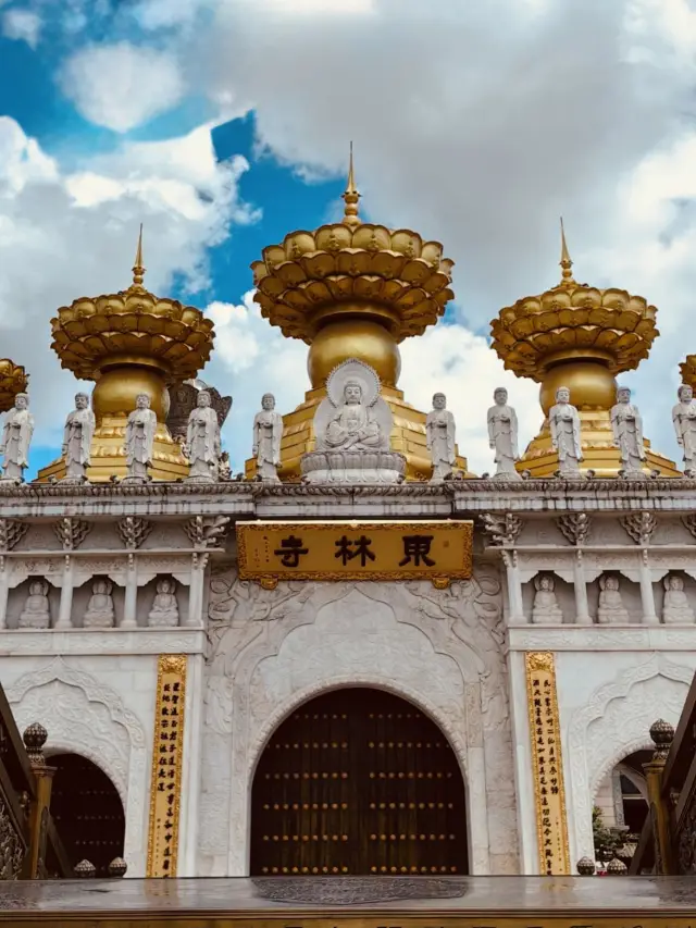 A Grand Buddhist Sanctuary with Towering Statues