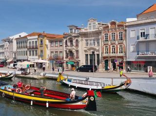 Canals, Colorful Boats, and Urban Charm in Aveiro