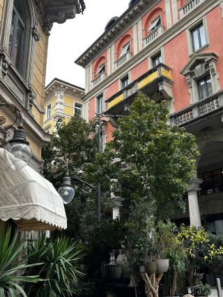 Exploring Lugano’s lakeside vibes and hidden gems! 🌧️🌺 If you love a cozy city wrapped around a shimmering lake, Lugano delivers. From the charming Old Town and its mix of Western-style buildings (think wrought iron balconies with flowers) to lush parks and foodie spots in the city center, this Swiss town has style for days.

Top Spots to Visit:  
1. Old Town Lugano—Switzerland  
Stroll amid centuries-old architecture, bubbling fountains (look out for those gooseneck faucets spraying water and surrounded by flower bursts!), and cute alleyways. Lugano’s old quarter is open round the clock, and it’s still gorgeous even when cloudy or rainy.  
2. Lugano Park  
Ideal for outdoor cultural landscapes, chill lakeside walks, and people-watching. The green areas pop with trees and red blossoms—bring a camera!  
3. Gabbani, via Pessina 12  
Foodie tip: For local eats with a Western twist, grab lunch at Gabbani (right in the city center). It’s a great spot to shelter from Lugano’s unpredictable weather and savor Swiss specialties.

Local Insights & Tips:  
Rainy days are common—pack a compact umbrella. Lugano’s architecture keeps things Instagram-worthy whatever the weather. Use the lakeside park as your recharge spot

Getting Around:  
Public transport here is super reliable, but the best way to soak up the scenery is just on foot. Lugano’s core is walkable—enjoy hidden picturesque corners.

#LuganoVibes #SwissCityBreak #LakeLife #TravelTips #TripDotCom