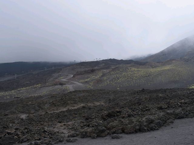 Exploring the foggy Mount Etna 