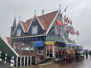 Volendam is located on the southwest shore of Lake IJsselmeer in the province of North Holland, Netherlands, about 20 kilometers from the capital, Amsterdam, with a population of approximately 22,000.