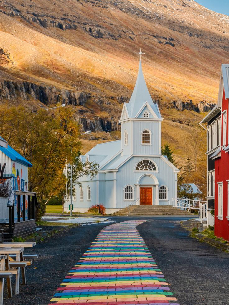 Seyðisfjörður — The Icelandic Fjord Town Where Rainbow Streets Meet Waterfalls and the Mountains 