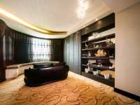 "The Promenade Hotel-Where City Convenience Meets Cozy Comfort"