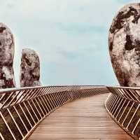 🌉✨ *Golden Bridge (Cầu Vàng): Vietnam’s Giant Hands Holding a Gilded Pathway* 🏞️🌿