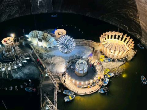 #winterescape 🧂 Discover the Magical Depths of Turda Salt Mine! 🌌🕳️
Hidden beneath the Romanian town of Turda, the Salina Turda dazzles with a surreal world of salt-carved chambers, shimmering underground lakes, and retro-futuristic installations—all indoors and legendary for Insta magic!

🗺️ Recommended Route & Must-Dos:
Start at the main entrance (Aleea Durgăului 7) and grab your tickets before 4:00 PM! Wind your way through the main gallery, then descend into Rudolf Hall—don’t miss the underground amusement park with its ferris wheel and mini-golf course, all set against ancient salt walls. Explore the Terezia Mine for jaw-dropping views of the underground lake; you can even rent a rowboat for an out-of-this-world experience.

📸 Top Photo Spots:
Snap wide-angle shots in the amphitheater area—those artful salt formations with dramatic lighting are pure wow. The lake reflections in Terezia Mine create ethereal, mirror-like images (even phone cameras pop here!). Play with the futuristic ride installations for quirky, unforgettable selfies.

💡 Practical Tips:
The mine stays consistently cool—dress in layers and wear comfy shoes for lots of walking. Guided tours are available for deeper history, but self-guiding lets you linger for photos. Restrooms and a snack café are inside, but bring a water bottle; the salty air is surprisingly dry.

⚠️ Key Precautions:
Admission ends at 4:00 PM, so time your trip to allow at least 2 hours for exploring. Some stairs and ramps are steep—if you have mobility concerns, check accessibility info in advance. The mine is entirely indoors: perfect for rainy days but expect limited natural light for photos.

#Turda #SalinaTurda #Romania #UndergroundAdventure #IndoorExploration