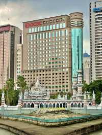 Where Rivers and Faith Meet: A Quiet Moment at Masjid Jamek