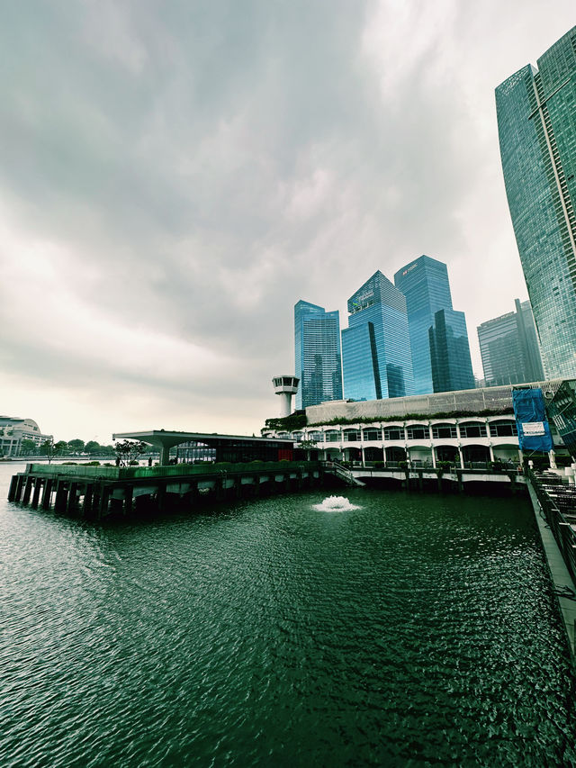 Calm Before the Rain: A Waterfront Stroll Near The Fullerton Bay Hotel
