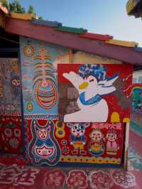Rainbow Village: A Colorful Legacy of Rainbow Grandpa's Art