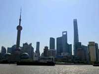 Taking a nice day time stroll across The Bund at Shanghai