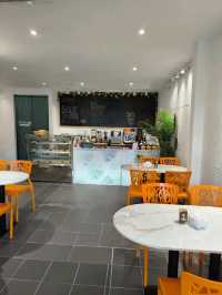 Sunny Yellow Café That Feels Like a Garden Retreat