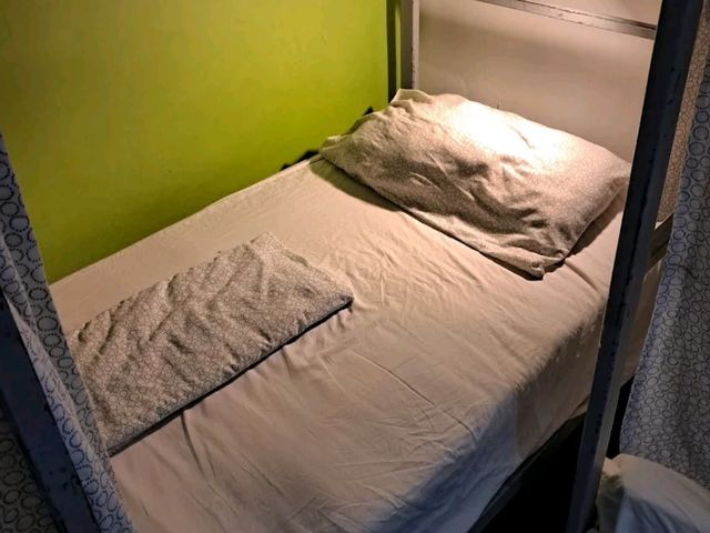 “Budget Sleep with Bold Flaws: Money‑Saver Close to MRT”