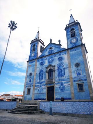 A breathtaking view of blue! Head to the beautiful Igreja de Cortegaça, fully covered in azulejos.