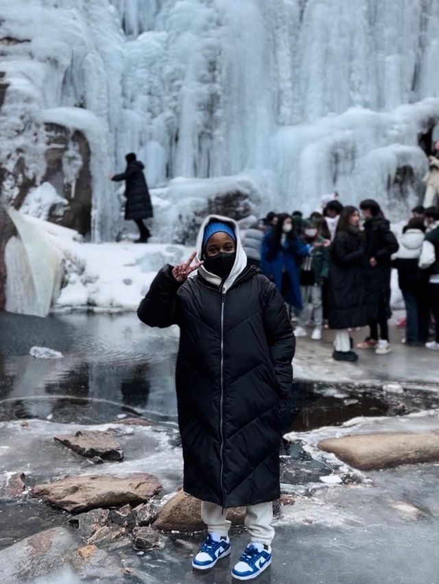 Stand on Frozen Waterfalls of Qingdao