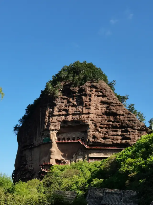 The May Day holiday is approaching, come and visit the Maijishan Grottoes to admire the Buddha statues