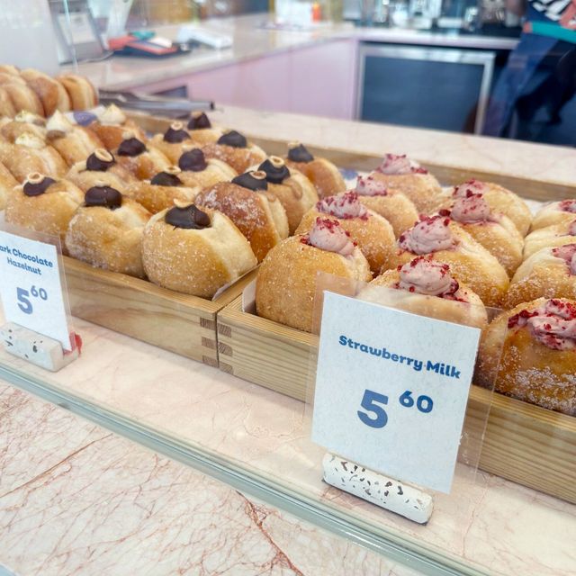 Check out this pretty bomboloni cafe!