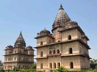 #asiabudgetchallenge
🕌 Orchha – A Hidden Gem on the Banks of Betwa!

📍Location: Orchha, near Jhansi, Madhya Pradesh

🎫 Entry Fee: ₹10 (Indians), ₹250 (Foreigners) for fort complex

🕰 Opening Hours: 9:00 AM – 5:00 PM

⏳ Recommended Duration: Full day or overnight

🗺 Best Time to Visit: October to March


---

🌟 Why You’ll Love It

Orchha feels like a fairy tale frozen in time. This peaceful riverside town was once the capital of the Bundela kings—and today, it's a photographer’s paradise, filled with majestic palaces, intricately designed temples, and serene cenotaphs (chhatris). Far from the crowds, Orchha offers a blend of history, romance, and rustic charm. 💕


---

🏰 Top Attractions

🔹 Orchha Fort Complex – Home to three beautiful palaces: Raja Mahal, Jahangir Mahal, and Rai Praveen Mahal—each whispering tales of royalty and valor.

🔹 Chaturbhuj Temple – A tall and unique temple dedicated to Lord Vishnu, built to look like a fortress.

🔹 Ram Raja Temple – The only temple in India where Lord Ram is worshipped as a king in a palace setting!

🔹 Orchha Chhatris – Stunning riverside cenotaphs honoring the royal family—especially beautiful at sunset. 🌅

🔹 Betwa River – Go for a calm boat ride or just relax by the ghats.


---

🚗 How to Reach

By Train: Jhansi Railway Station (20 mins away) is the nearest big station.

By Air: Gwalior Airport (120 km) is the nearest airport.

By Road: Well-connected by road from Jhansi, Khajuraho, and Gwalior.



---

💡 Travel Tip

Climb to the top of Jahangir Mahal for a panoramic view of Orchha and the surrounding jungle. Stay overnight in a riverside resort or heritage homestay for the real vibe. 🌿


---

🌟 Verdict

Orchha is a royal retreat with a soul. Quiet, underrated, and full of heritage—it’s the kind of place that stays with you long after you leave. A must-visit for history buffs, spiritual seekers, and romantic wanderers! 🌸


---

#Orchha #IncredibleIndia #MadhyaPradeshDiaries #HiddenIndia #OrchhaFort #ChhatrisOfOrchha #RoyalGetaway #TravelMP #IndiaHeritage #TempleTales

