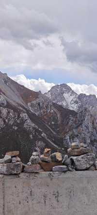 不去這山就去納山