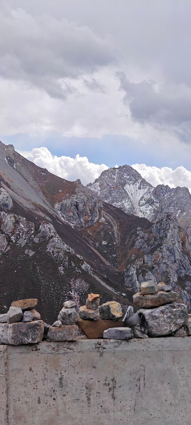 不去這山就去納山