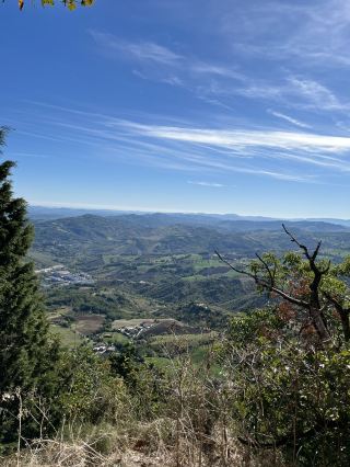 Discover San Marino’s Green Heart – Hiking Amid Hills & Ancient Streets 🌿🏞️  
If you crave pretty landscapes and a refreshing hike, San Marino charms with its emerald hills, panoramic trails, and serene town vibes. Expect sunny skies and outdoor natural beauty just waiting to be explored!

Begin your adventure along Sentiero della Rupe (Via J.f. Kennedy) – open year-round, this cliffside path lets you soak in lush tree views and overlooks that are pure nature goals (don't miss the vantage toward the distant town with that ‘insta-worthy’ horizon). Next, pass through Porta della Rupe, a historic gateway with dramatic photo angles; perfect for capturing your entrance into San Marino’s old-world magic!

Make your way to Passo Delle Streghe, where the hillside opens up for sweeping valley shots – a must for those ‘nature-overlooking’ moments with clear, peaceful skies. Continue on to the unique Great Female Nude Statue (Piazzetta del Titano); its artistic silhouette gives a contrast to natural scenery, ideal for a creative photo or a moment’s pause.

For a tactile twist, visit TACTILIA (Via Eugippo, 26), a space offering tourist info and culture for the visually impaired – highlighting how inclusive San Marino’s trails can be.

Tips: The hike is gentle but pack water and sturdy shoes. Early morning or late afternoon shows the hills at their most photogenic (and less crowded). Watch out for sun exposure – hat and sunscreen are a must under the clear sky!  

#SanMarino #Hiking #OutdoorAdventure #ScenicViews #TravelEurope