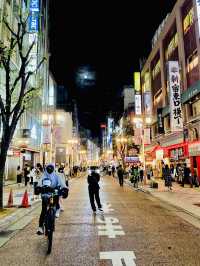 Godzilla and the bustling street of Shinjuku