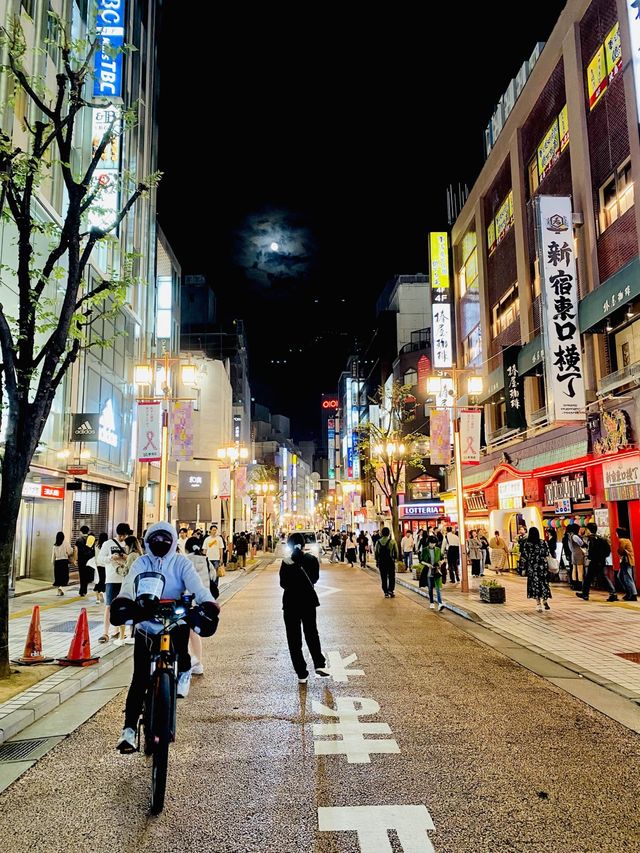 Godzilla and the bustling street of Shinjuku