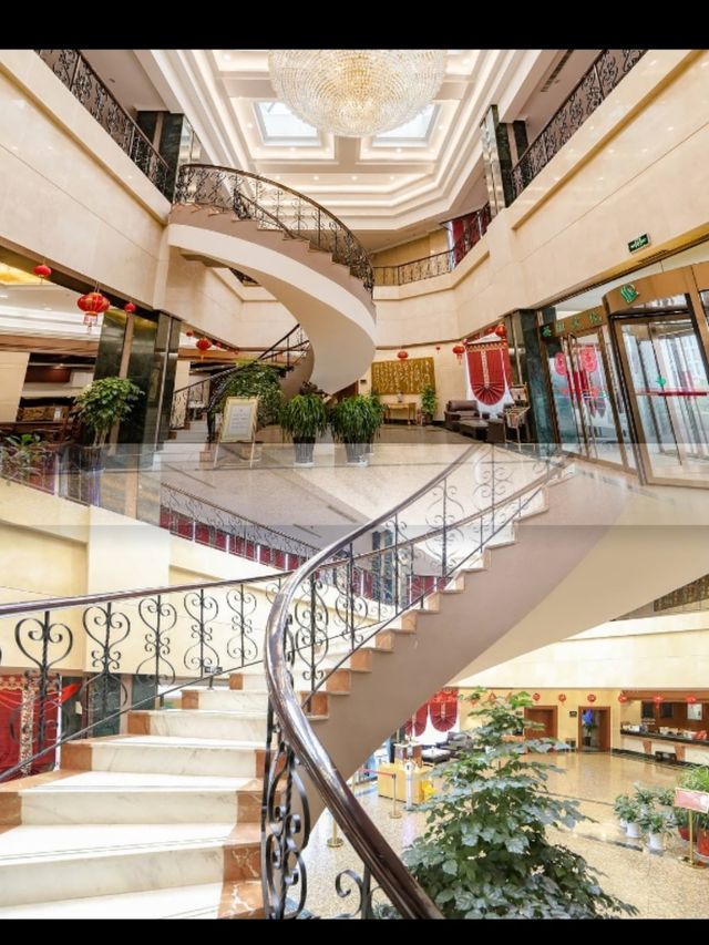 《泗水聖源酒店：休閒與放鬆的樂園》