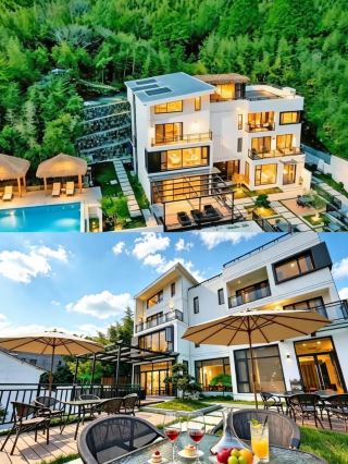 I'm truly captivated by this white villa terrace and courtyard surrounded by a sea of bamboo