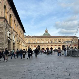 🏛️ “Where Red Brick Breathes: A Pause in Piazza Maggiore”