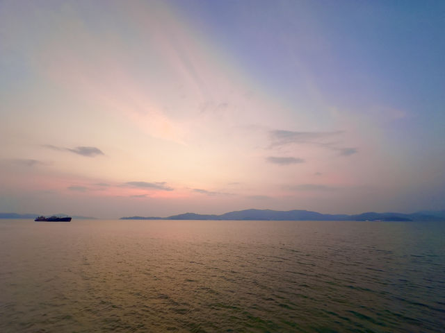 Sunset by a lighthouse 